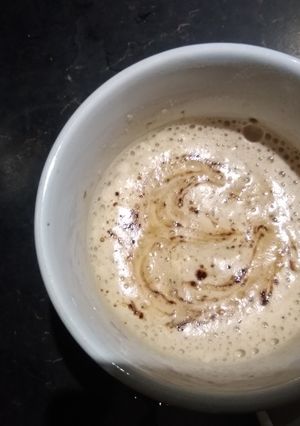 A picture of Hand beaten foamy coffee.