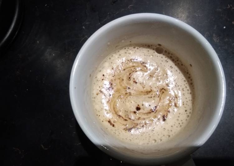 Hand beaten foamy coffee