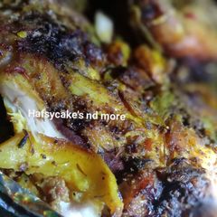 A picture of Grill chicken with potatoes.