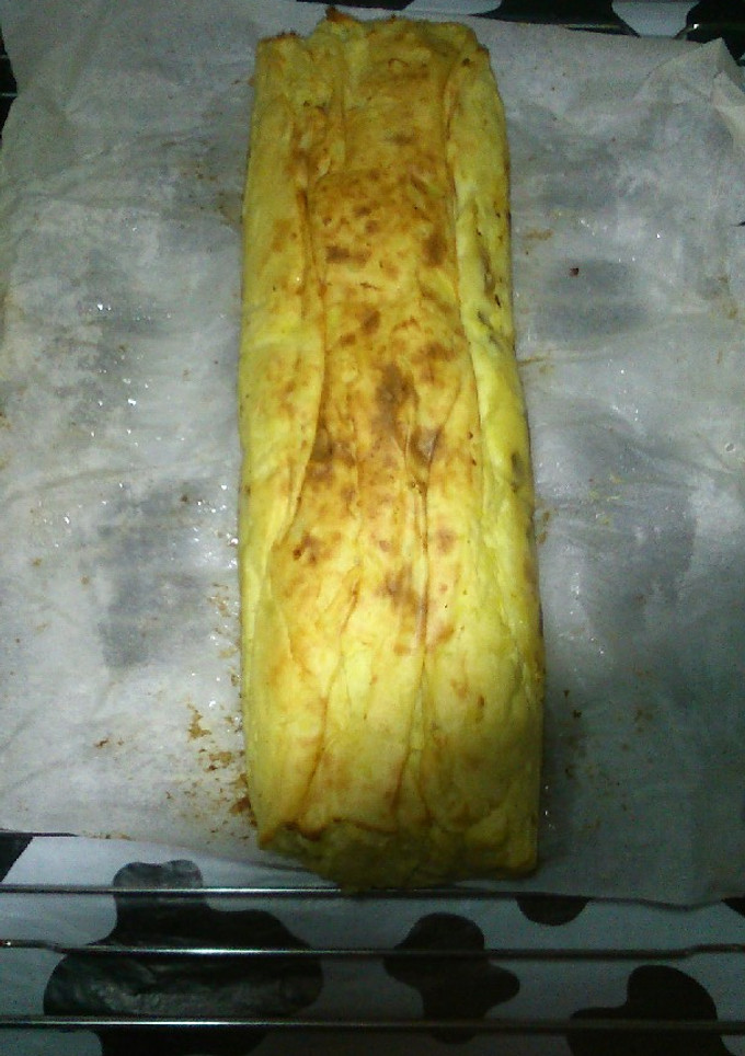 Una foto de Redondo de patata relleno