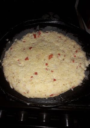 Una foto de Tortilla de sobras de arroz con queso