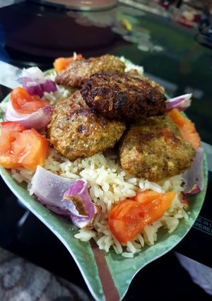A picture of Oven-Grilled Kofta with Butter Rice.