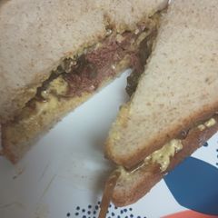 A picture of Buttered Braunschweiger and Pickled Onions.