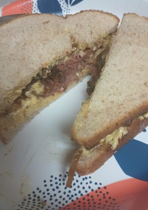 A picture of Buttered Braunschweiger and Pickled Onions.