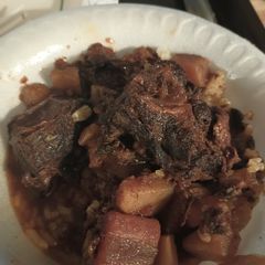 A picture of Goat and Onions.