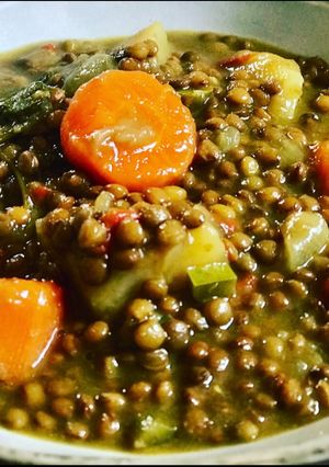 A picture of Vegetarian Lentil Stew with Ginger, Turmeric, and Cilantro 🌿.