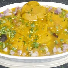A picture of Matar Dal with Indian Style Tortillas & Spicy Dumplings.