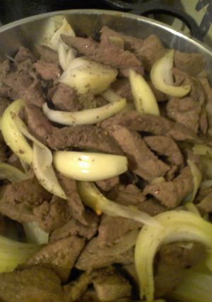 Una foto de Hígado encebollado