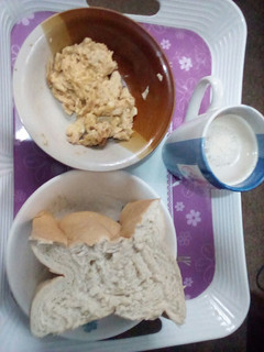 A picture of Bread, omelette and Coffee Drink.