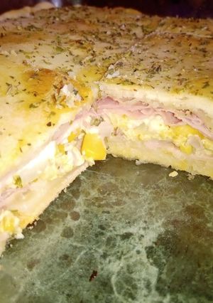 Una foto de Tarta de Choclo, Cebolla, Jamón y huevo