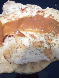Una foto de Bacalao Skrei a la Plancha con Parmentier de Cebolla a la Naranja
