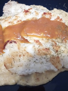 Una foto de Bacalao Skrei a la Plancha con Parmentier de Cebolla a la Naranja