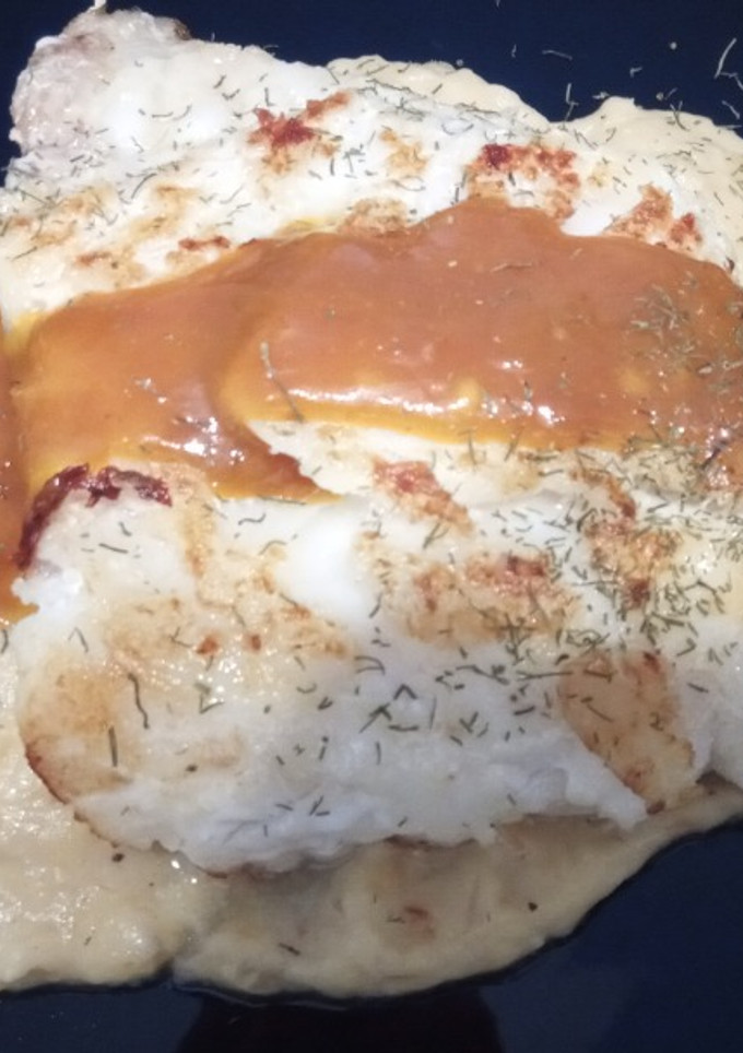 Una foto de Bacalao Skrei a la Plancha con Parmentier de Cebolla a la Naranja