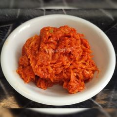 Spicy raw mango kachumbar (takku) A picture of Spicy raw mango kachumbar (takku).