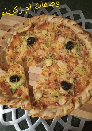 صورة لوصفة بيتزا سهلة وبنينة بزاف بشكل جميل 🍕🍕🍕🍕