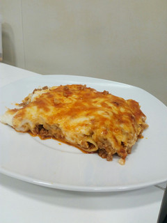 Una foto de Canelones fáciles con pesto rosso