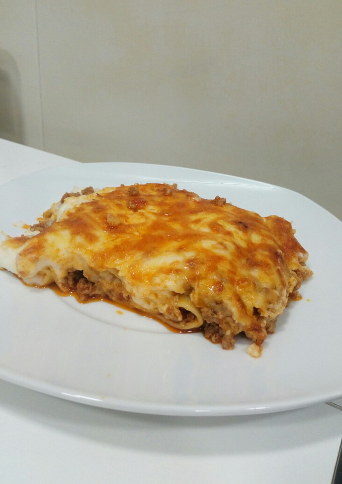 Una foto de Canelones fáciles con pesto rosso