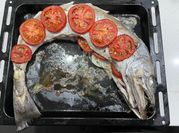 Una foto de merluza al horno