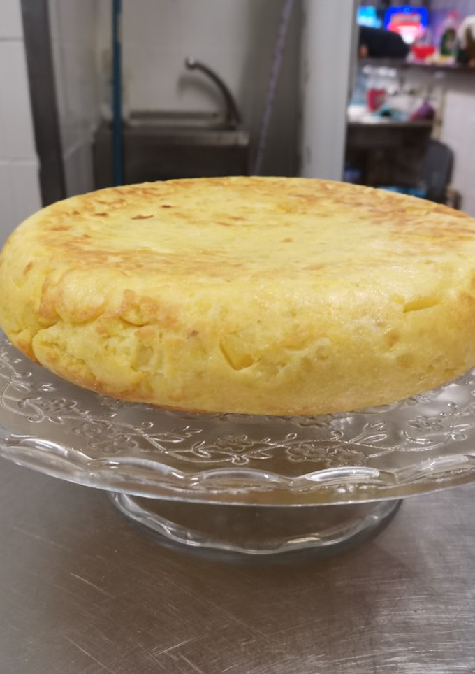 Una foto de Tortilla de patatas con cebolla
