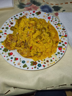 Una foto de Paella de pollo
