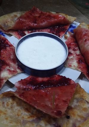 A picture of Healthy and Tasty 🍓 jam paratha 😋.