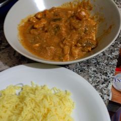 A picture of Chicken Curry with Basmati Rice.