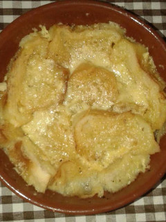 Una foto de Sopa de cebolla gratinada