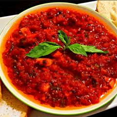A picture of Mike's Garlic Basil Tomato Olive Oil Appetizer.