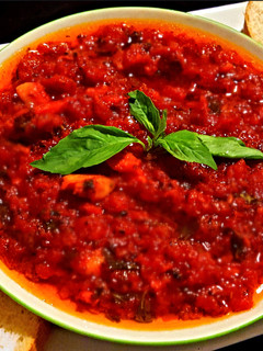 A picture of Mike's Garlic Basil Tomato Olive Oil Appetizer.