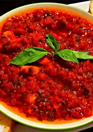 A picture of Mike's Garlic Basil Tomato Olive Oil Appetizer.