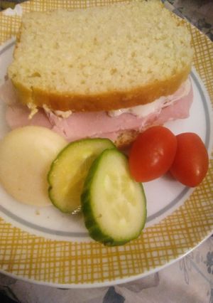 A picture of Small ham sandwich with light Philadelphia.