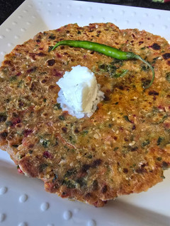 A picture of Spring onion methi Thalipeeth.