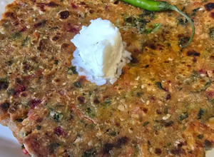 A picture of Spring onion methi Thalipeeth.