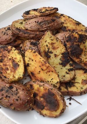 Une photo de Pommes de terre grillées ail et persil (à la plancha)