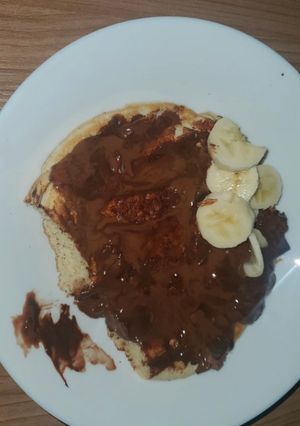 Una foto de Tortita proteica con chocolate y plátano