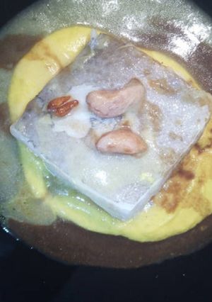 Foto principal de Lomos de Bacalao a Baja Temperatura en Crema de Cúrcuma y Trufa en Salsa de P.X. y Pil Pil
