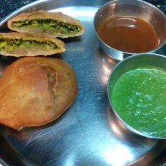 A picture of The green trio kachori.