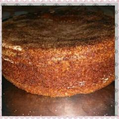 A picture of Eggless biscuit cake in pressure cooker.