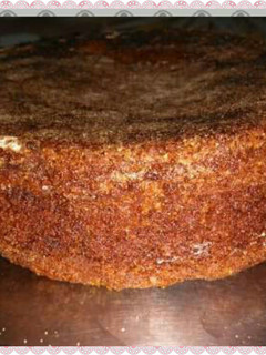A picture of Eggless biscuit cake in pressure cooker.