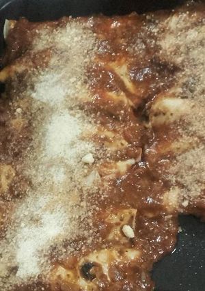 Una foto de Canelones de espinaca, pollo y zanahoria