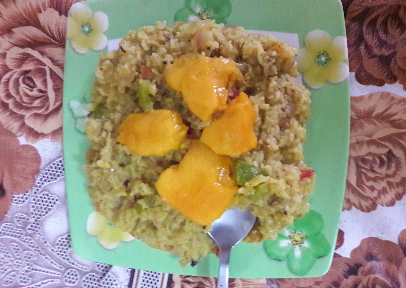 Moong dal khichdi with onion tomato and capsicum tadka