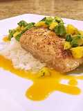 Pan seared halibut on coconut rice with mango peach habanero sauce and mango avocado salsa