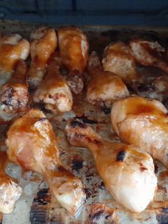 A picture of Brown sugar glazed chicken drumsticks.