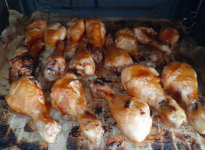 A picture of Brown sugar glazed chicken drumsticks.
