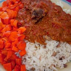 A picture of Pepper stew with rice and beans.