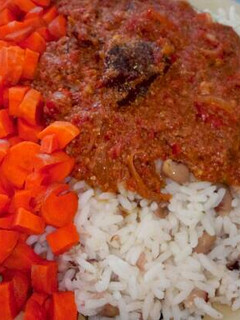 A picture of Pepper stew with rice and beans.