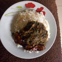 Rice and ofeakwu with dodo A picture of Rice and ofeakwu with dodo.