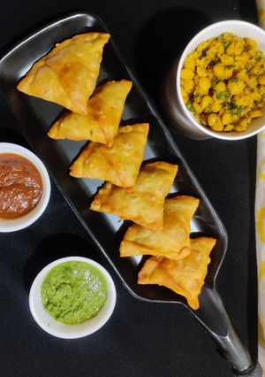 A picture of Crispy Chana dal maida samosa (jain snack).