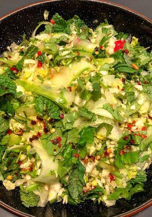 A picture of Thai cucumber salad with sour chili dressing.
