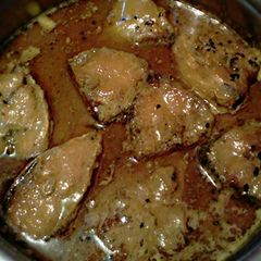 A picture of Mustard seeds hilsha fish curry.
